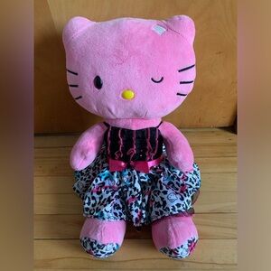 Pink winking Hello kitty build-a-bear plushie, with dress and panties